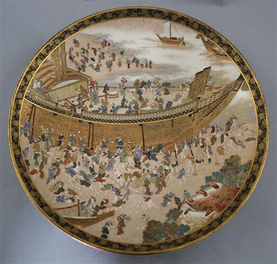 A Japanese Satsuma pottery dish, for Taizan Company, Meiji period, 30.5cm.